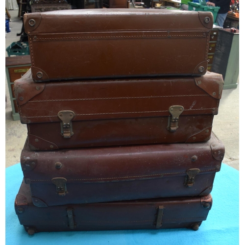 2591 - FOUR VINTAGE LEATHER SUITCASES. 66 cm x 41 cm. (4)