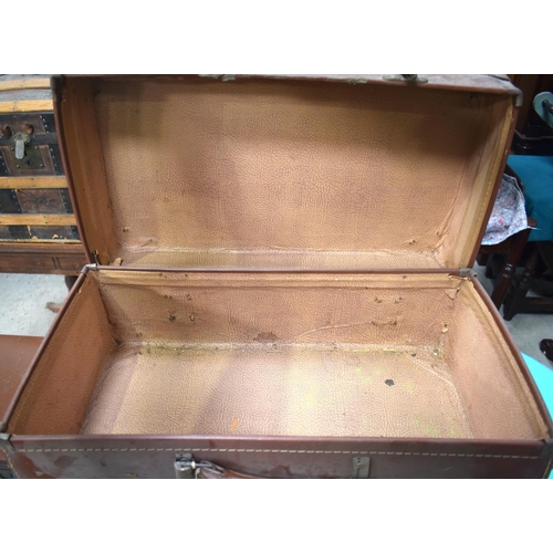 2591 - FOUR VINTAGE LEATHER SUITCASES. 66 cm x 41 cm. (4)