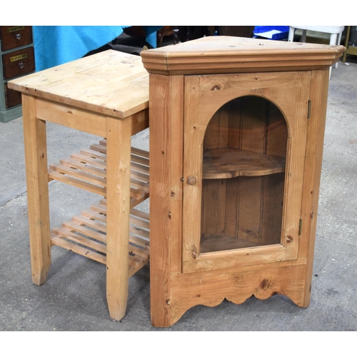 2597 - A PINE HANGING CORNER CUPBOARD and a butchers block. Largest 100 cm x 52.5 cm. (2)