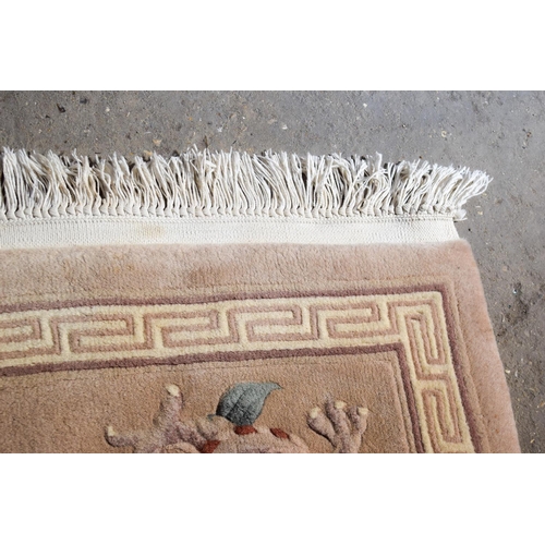 2602 - AN ART DECO STYLE CHINESE RUG. 154 cm x 87 cm.