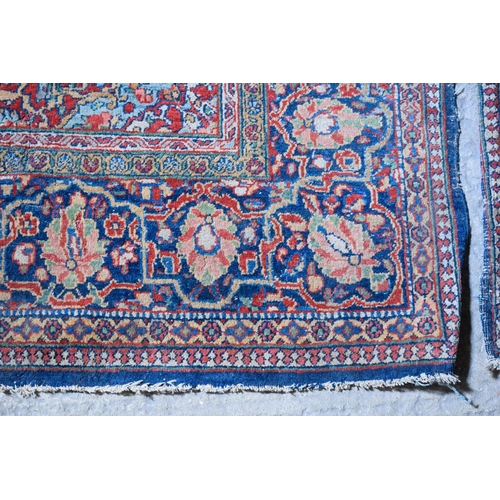 2604 - A LOVELY PAIR OF EARLY 20TH CENTURY MIDDLE EASTERN CARPETS decorated with foliage and vines. 218 cm ... 
