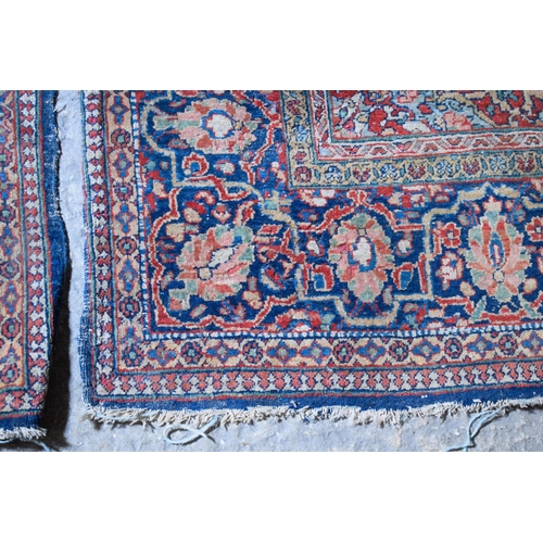 2604 - A LOVELY PAIR OF EARLY 20TH CENTURY MIDDLE EASTERN CARPETS decorated with foliage and vines. 218 cm ... 