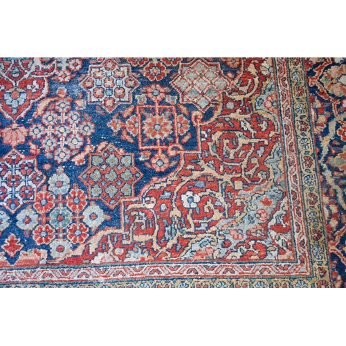 2604 - A LOVELY PAIR OF EARLY 20TH CENTURY MIDDLE EASTERN CARPETS decorated with foliage and vines. 218 cm ... 