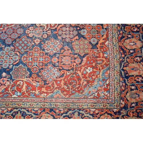 2604 - A LOVELY PAIR OF EARLY 20TH CENTURY MIDDLE EASTERN CARPETS decorated with foliage and vines. 218 cm ... 
