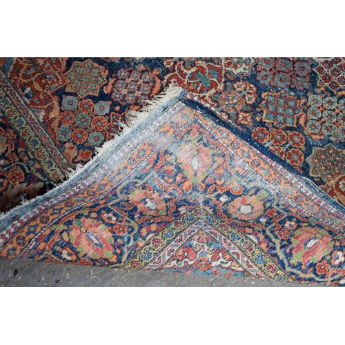 2604 - A LOVELY PAIR OF EARLY 20TH CENTURY MIDDLE EASTERN CARPETS decorated with foliage and vines. 218 cm ... 