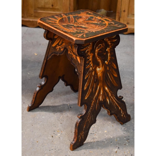2608 - A RARE CONTINENTAL ART NOUVEAU FRUITWOOD PHOENIX STOOL decorated with various birds. 52 cm x 41 cm.
