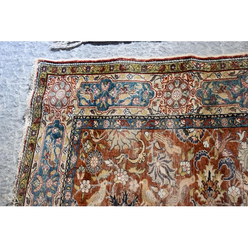2611 - AN EARLY 20TH CENTURY MIDDLE EASTERN PERSIAN RUG together with a deco style rug. Largest 175 cm x 12... 