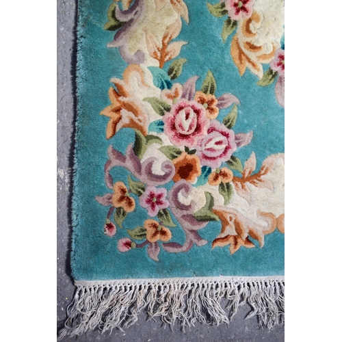 2611 - AN EARLY 20TH CENTURY MIDDLE EASTERN PERSIAN RUG together with a deco style rug. Largest 175 cm x 12... 