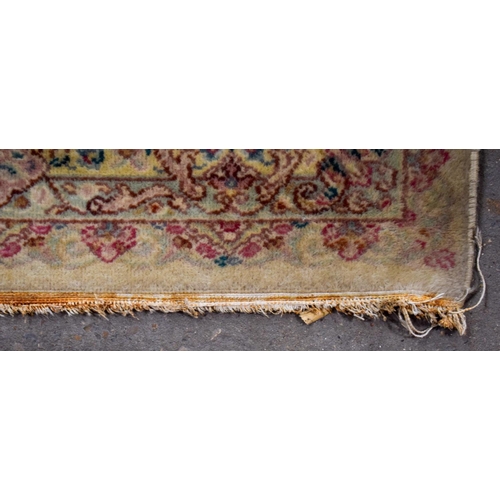 2612 - A LARGE MID CENTURY CONTINENTAL YELLOW GROUND CARPET. 367 cm x 262 cm.