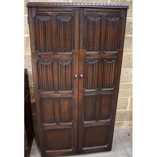 2613 - A MID CENTURY ERCOL TYPE WARDROBE together with a similar bureau. Largest 177 cm x 91 cm. (2)