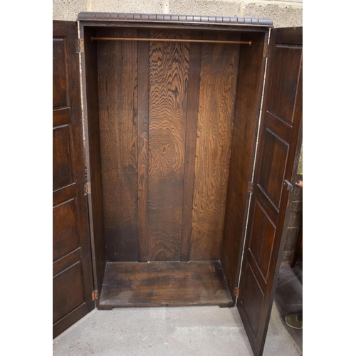 2613 - A MID CENTURY ERCOL TYPE WARDROBE together with a similar bureau. Largest 177 cm x 91 cm. (2)