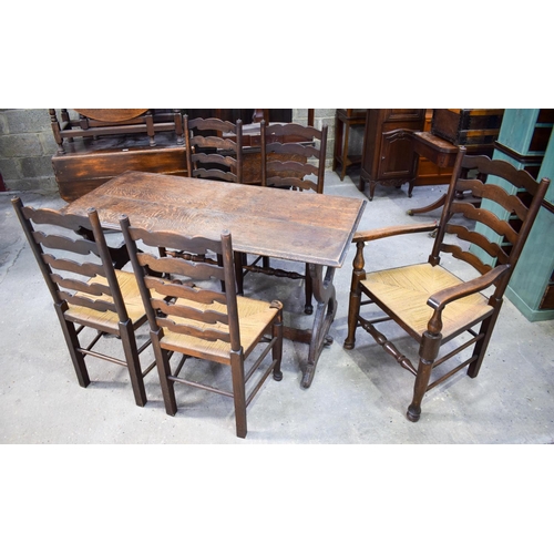 2616 - AN ERCOL STYLE DINING TABLE with five chairs. Table 146 cm x 70 cm. (6)