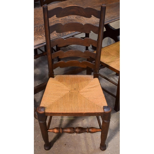 2616 - AN ERCOL STYLE DINING TABLE with five chairs. Table 146 cm x 70 cm. (6)