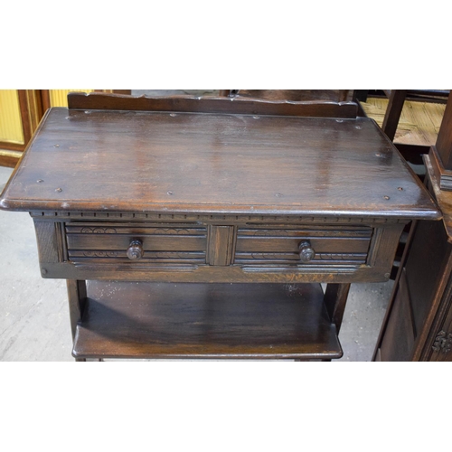 2617 - AN ERCOL CANTEEN together with a similar cupboard & a dressing table mirror. (3)