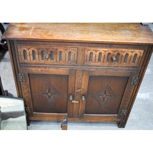 2617 - AN ERCOL CANTEEN together with a similar cupboard & a dressing table mirror. (3)