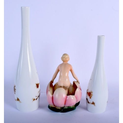 39 - AN ART DECO EUROPEAN PORCELAIN NUDE FEMALE together with two Rosenthal vases. Largest 30 cm high. (3... 