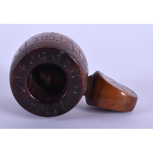 760 - A LOVELY 18TH CENTURY BOXWOOD TREEN CARVED WOOD NUT CRUCKER inscribed with a poem. 6.5 cm x 5 cm.