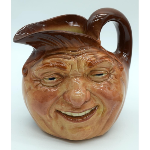 2527 - A  figure of a horse on a stand together with a Character jug of John Barleycorn . 26 x23cm. (2).