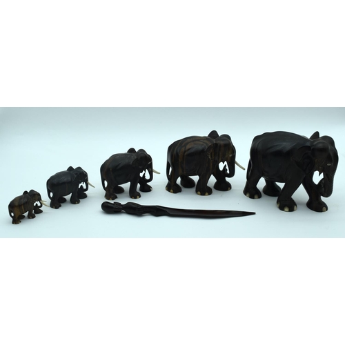 2528 - A Collection of African wooden Elephants and a page turner 13cm (6).