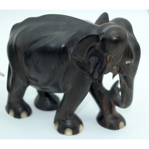 2528 - A Collection of African wooden Elephants and a page turner 13cm (6).
