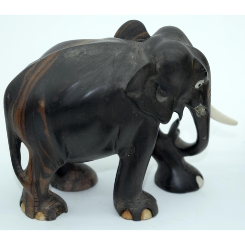 2528 - A Collection of African wooden Elephants and a page turner 13cm (6).