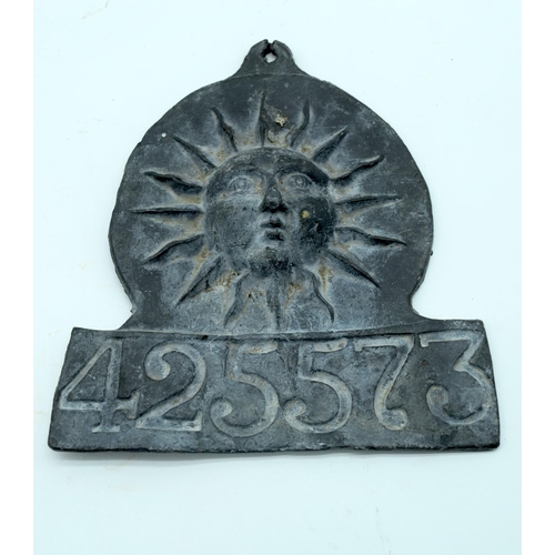 2533 - An antique London and Lancashire Fire Insurance lead plaque together with another lead plaque and  c... 