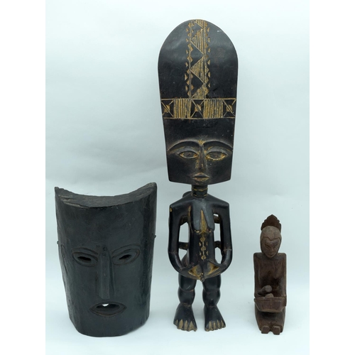 2535 - A African wooden fertility figure together with an African mask and figure 50cm (3).