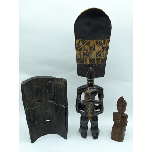 2535 - A African wooden fertility figure together with an African mask and figure 50cm (3).