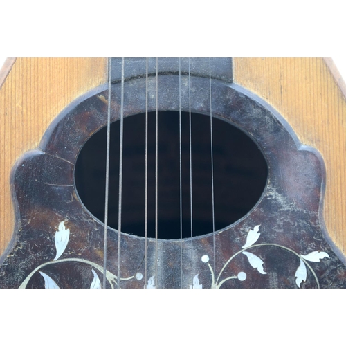 2548 - An antique Gennaro Maglioni mandolin with Mother of Pearl inlay 60cm .