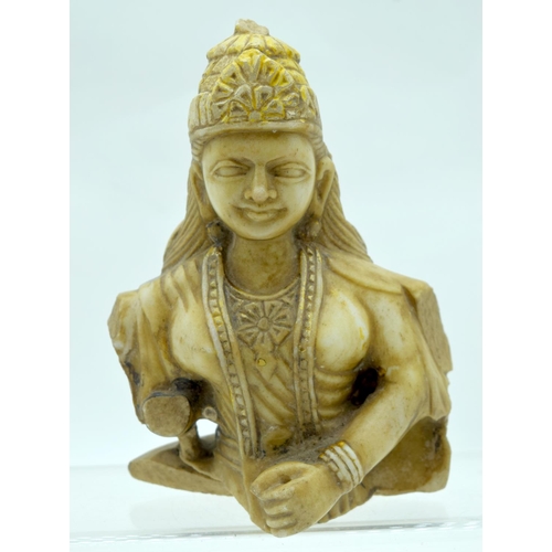 2554 - A alabaster carving of a South West Asian female 19cm.