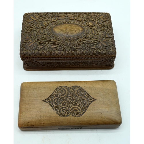 2558 - A mid century carved wooden box floral pattern together with carved wooden pen box 21cm (2).