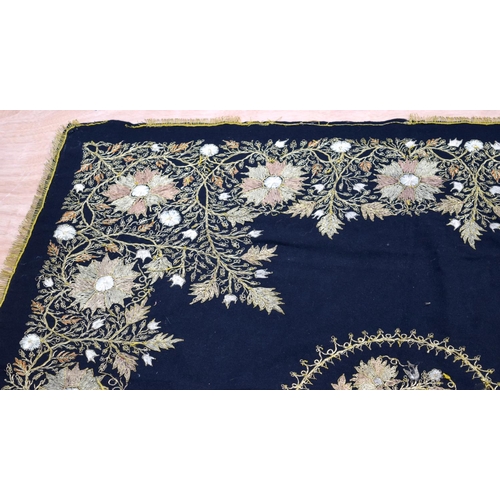 2562 - A large metal thread wall hanging decorated with a floral pattern 124 x 120cm .