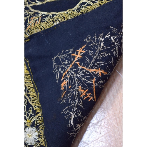 2562 - A large metal thread wall hanging decorated with a floral pattern 124 x 120cm .