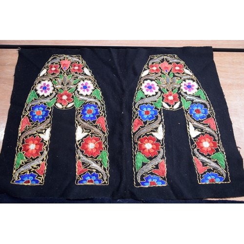 2563 - A metal thread and fabric embroider panel with a colourful display of flowers together with another ... 