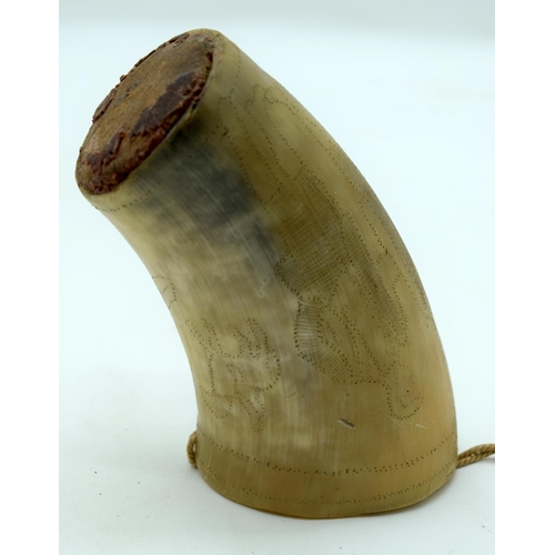 2564 - An engraved horn cup together with a pair of iron oil lamps and a bronze bell sounder. 24cm (4)