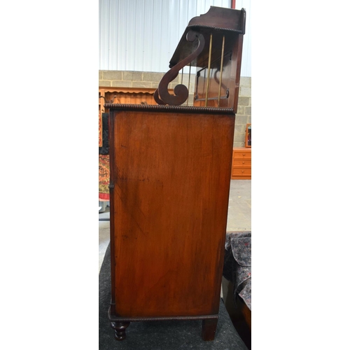 2566 - AN EARLY 19TH CENTURY SECRETAIRE MAHOGANY CHIFFONIER with lyre supports, brass mounts and reeded doo... 