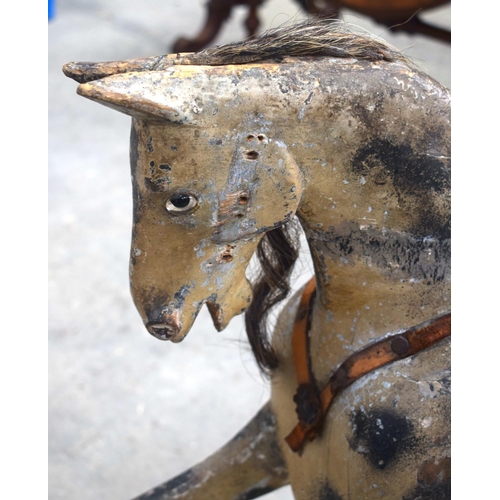 2573 - AN ANTIQUE ROCKING HORSE. 71 cm x 120 cm.