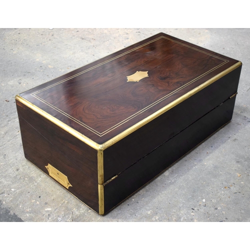 2576 - A FINE AND LARGE ANTIQUE CAMPAIGN TRAVELLING WRITING BOX with material slope and fitted interior. 61... 