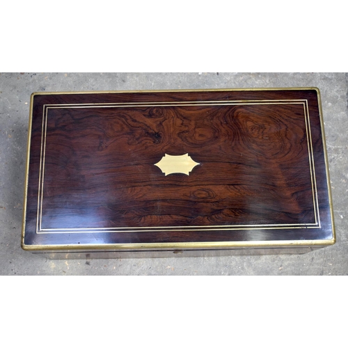 2576 - A FINE AND LARGE ANTIQUE CAMPAIGN TRAVELLING WRITING BOX with material slope and fitted interior. 61... 