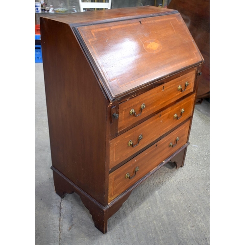 2577 - A GEORGE III STYLE MAHOGANY BUREAU. 97 cm x 40 cm.