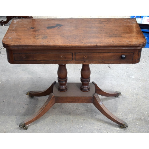 2579 - AN ANTIQUE MAHOGANY SOFA TABLE with rotating top and two dummy drawers. 73 cm x 46 cm.