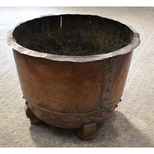2580 - AN ANTIQUE COPPER RIVETED JARDINIERE upon a stand. 35 cm x 54 cm.