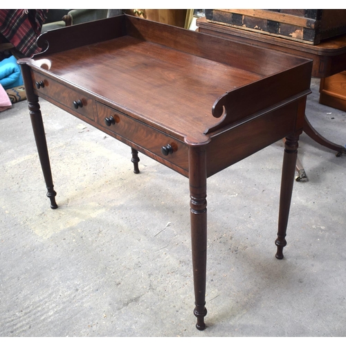 2581 - A GEORGE III MAHOGANY WRITING DESK upon slender legs. 105 cm x 65 cm.
