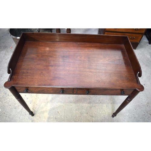 2581 - A GEORGE III MAHOGANY WRITING DESK upon slender legs. 105 cm x 65 cm.