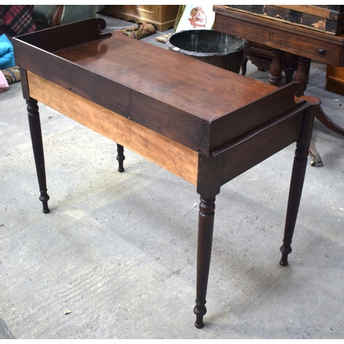 2581 - A GEORGE III MAHOGANY WRITING DESK upon slender legs. 105 cm x 65 cm.