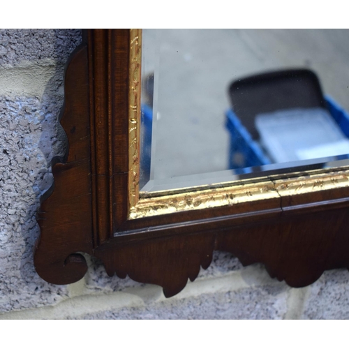 2583 - AN ANTIQUE MIRROR. 94 cm x 55.5 cm.