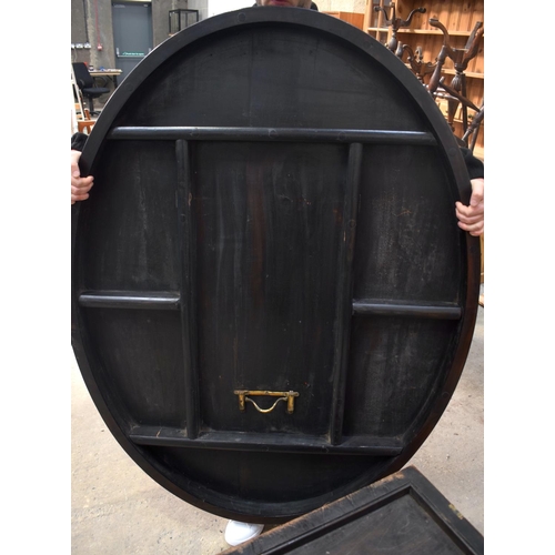 2588 - A LARGE VICTORIAN ROSEWOOD BREAKFAST TABLE upon a scrolling acanthus capped base. 148 cm x 73 cm.