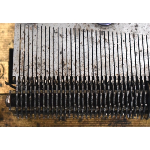 2589 - AN ANTIQUE SWISS MUSICAL SYMPHONIOM with separate discs. 45 cm x 22.5 cm.