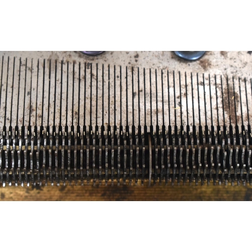 2589 - AN ANTIQUE SWISS MUSICAL SYMPHONIOM with separate discs. 45 cm x 22.5 cm.