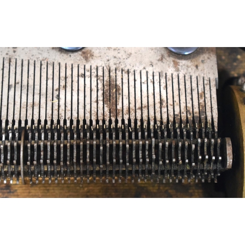 2589 - AN ANTIQUE SWISS MUSICAL SYMPHONIOM with separate discs. 45 cm x 22.5 cm.